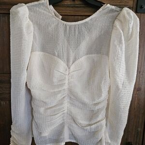 Cream Astr the label top